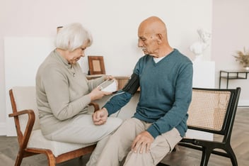seniors-using-blood-pressure-device